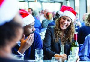 friends enjoying the holiday lunch on the water